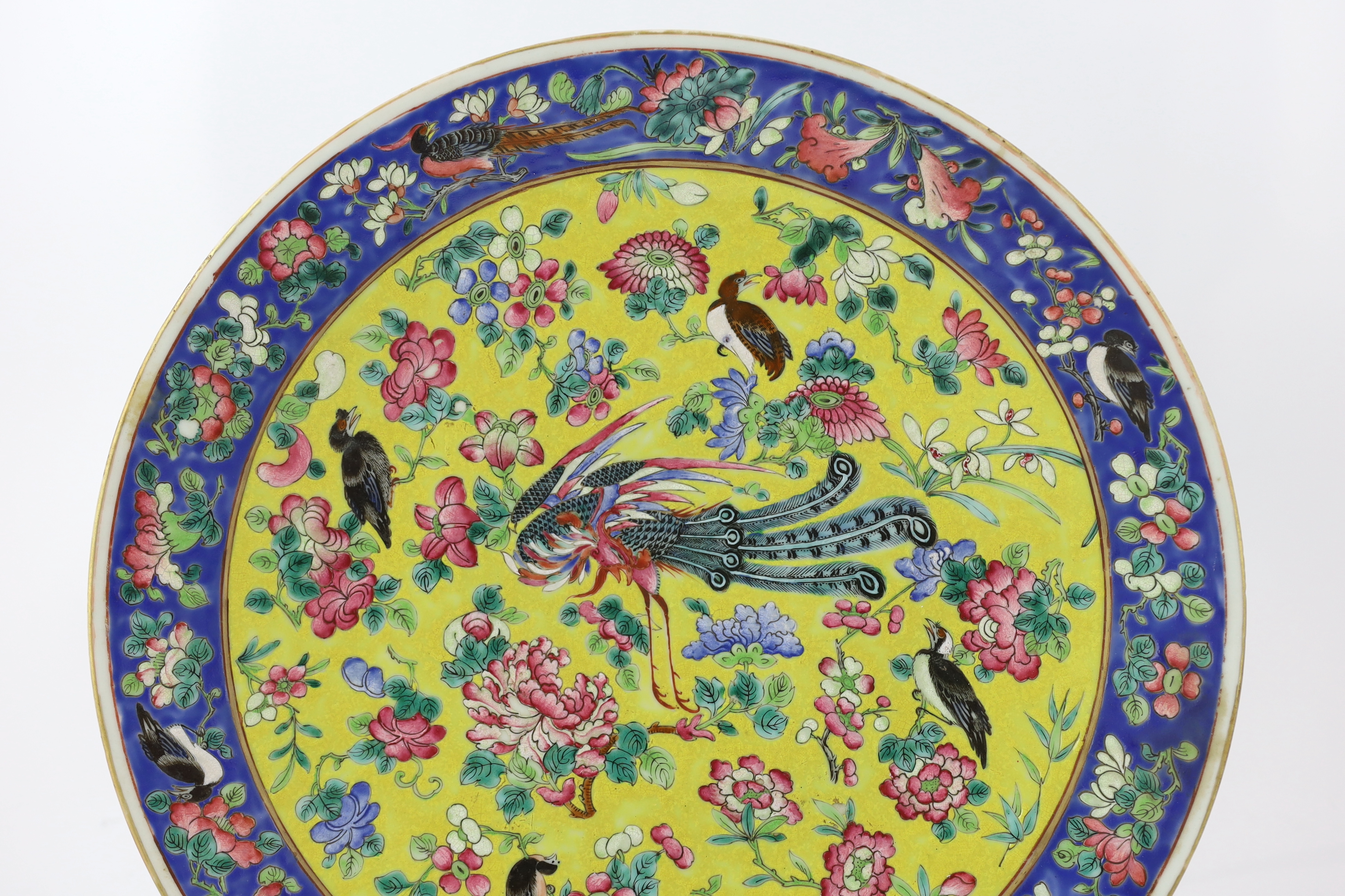 A Chinese yellow ground famille rose dish, late 19th century, with unusual Western script ‘F.L’ seal mark